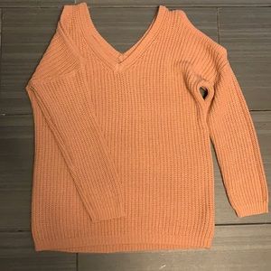Dusty rose coloured sweater with shoulders cutout